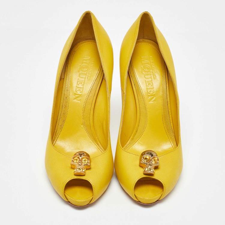 Pre Owned Alexander McQueen Yellow Leather Embellished Skull Peep Toe Pumps Size 38