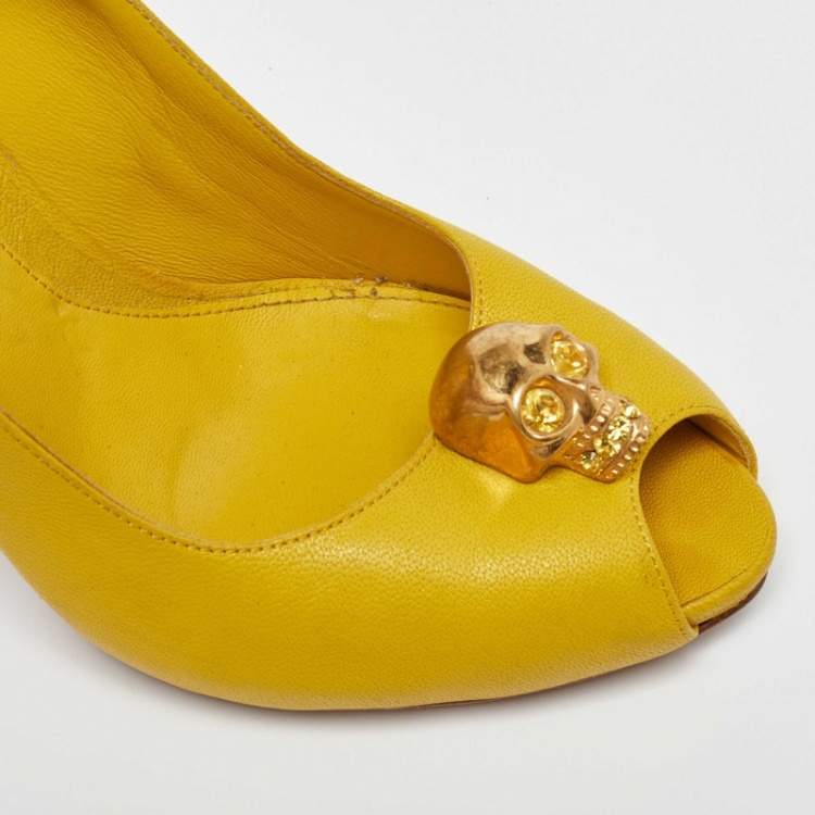 Pre Owned Alexander McQueen Yellow Leather Embellished Skull Peep Toe Pumps Size 38