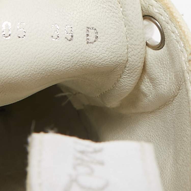 Pre Owned Alexander McQueen White Canvas and Rubber Tread Slick Lace Up Sneakers 39
