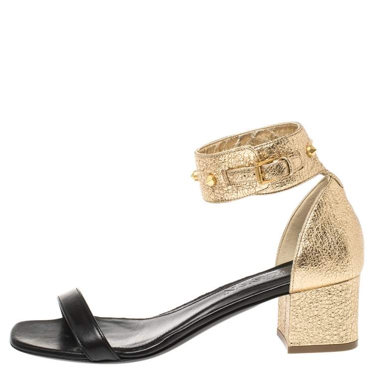 Pre Owned Alexander McQueen Gold/Black Leather Studded Ankle Wrap Sandals 39
