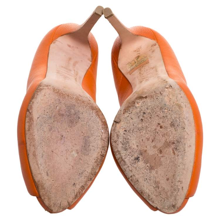 Pre Owned Alexander McQueen Orange Leather Skull Peep Toe Pumps Size 37.5