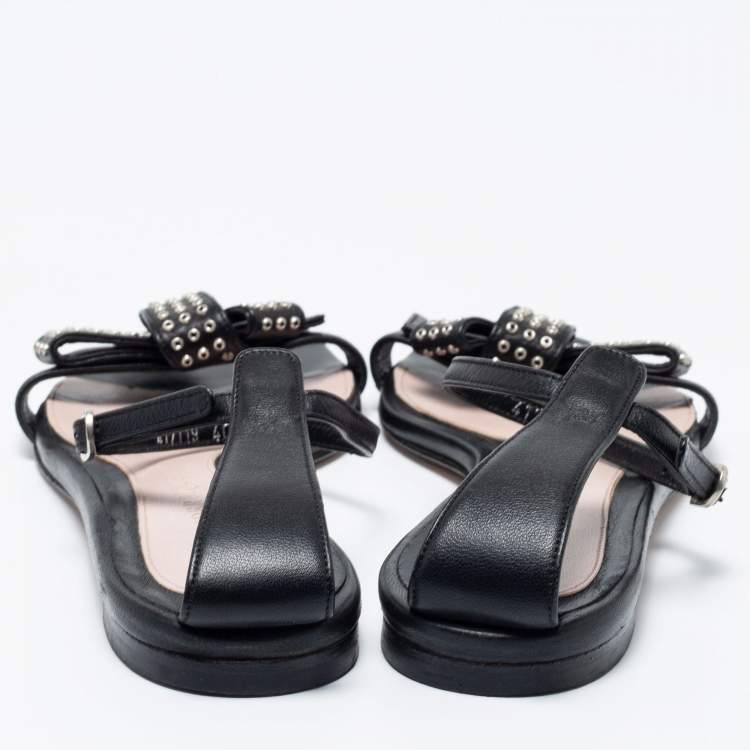 Pre Owned Alexander McQueen Black Leather Eyelet Embellished Bow Flat Ankle Strap Sandals Size 40