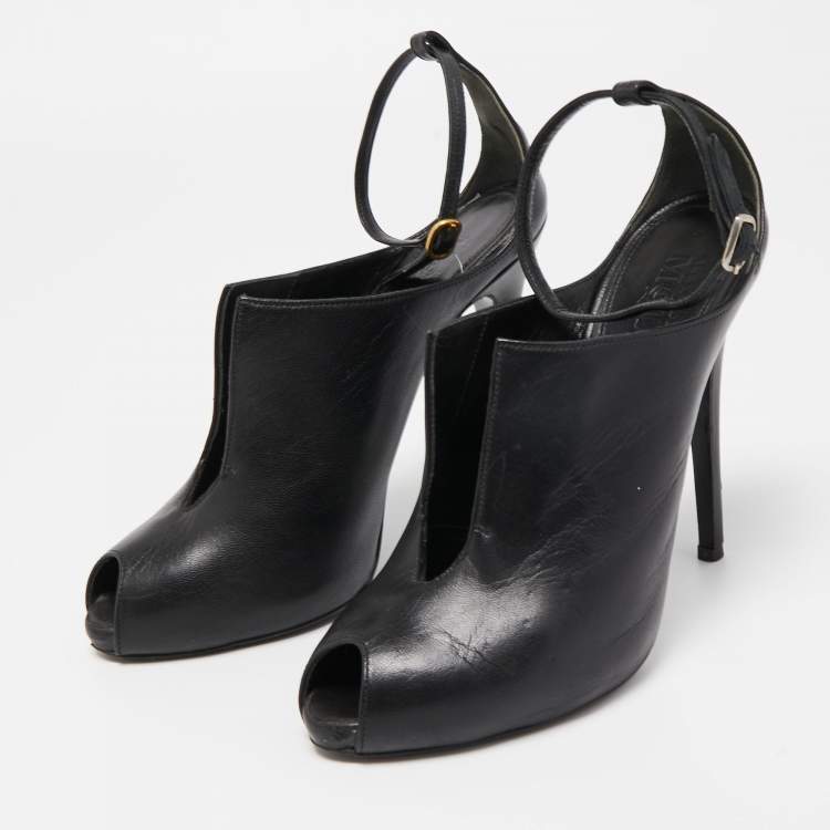 ALEXANDER MCQUEEN Cutout Buckled Leather Ankle Boots in Black