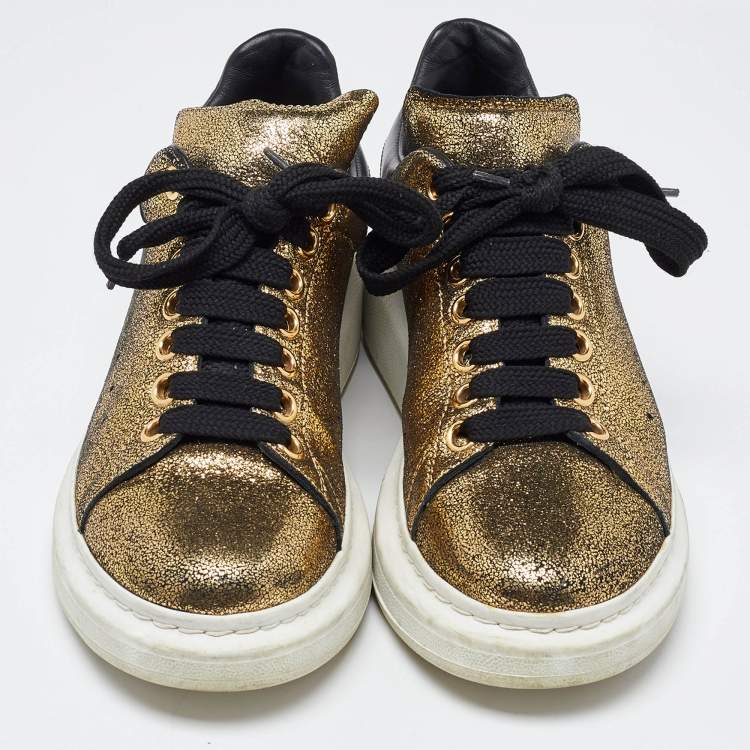 Pre Owned Alexander McQueen Gold/Black Foil Leather Oversized Low Top Sneakers Size 39