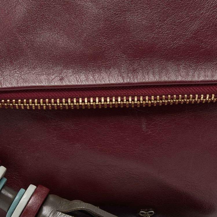 Pre Owned Anya Hindmarch Burgundy Leather Foldover Tassel Crossbody Bag