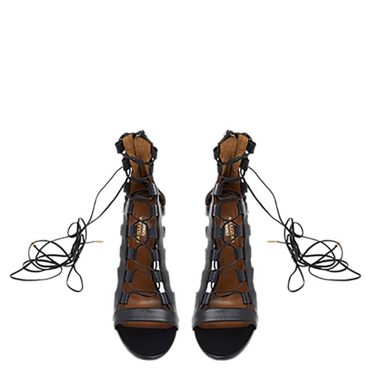 مملوكة مسبقًا Aquazzura Black Leather Amazon Lace Up Open Toe Sandals Size 38.5