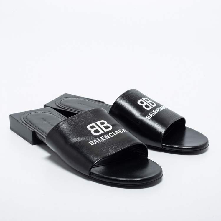 Pre Owned Balenciaga Black Leather Logo Print Flat Slides Size 38.5