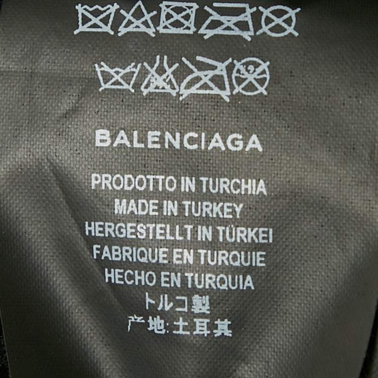 Pre Owned Balenciaga Black Logo Print Leather and Shearling Oversized Jacket S