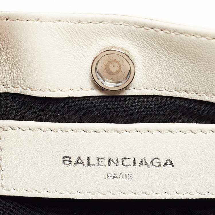 Pre Owned Balenciaga Off White Leather Perforated Logo Pochette Bag