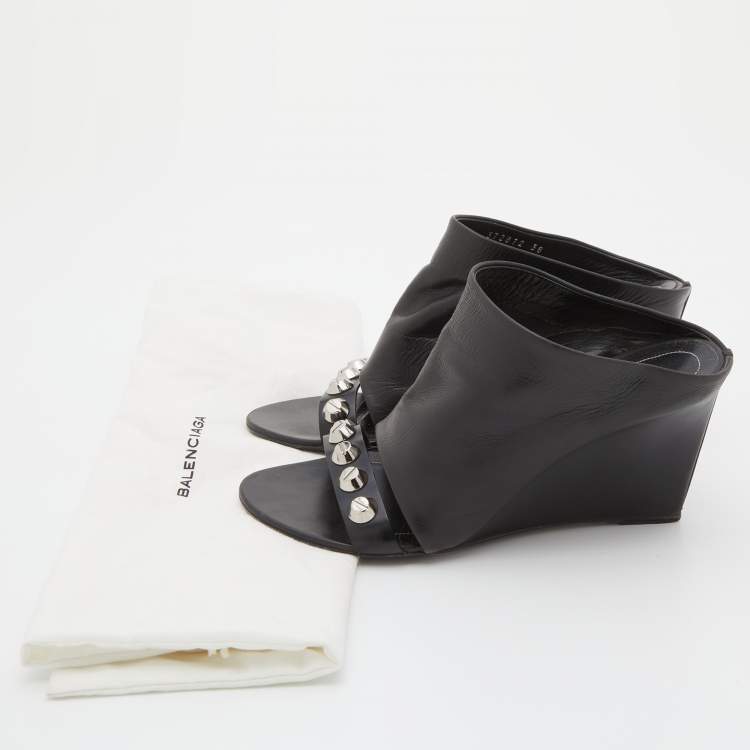مملوكة مسبقًا Balenciaga Black Leather Studded Arena Wedge Mules Size 38