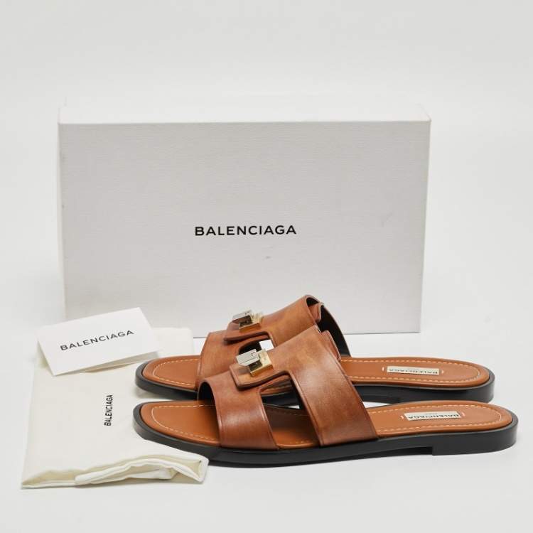Pre Owned Balenciaga Brown Leather Flip Lock Flat Slides Size 41