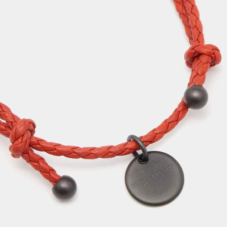 Pre Owned Bottega Veneta Intrecciato Orange Leather Gunmetal Tone Adjustable Double Cord Bracelet