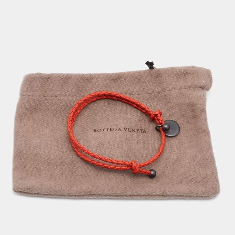 Pre Owned Bottega Veneta Intrecciato Orange Leather Gunmetal Tone Adjustable Double Cord Bracelet
