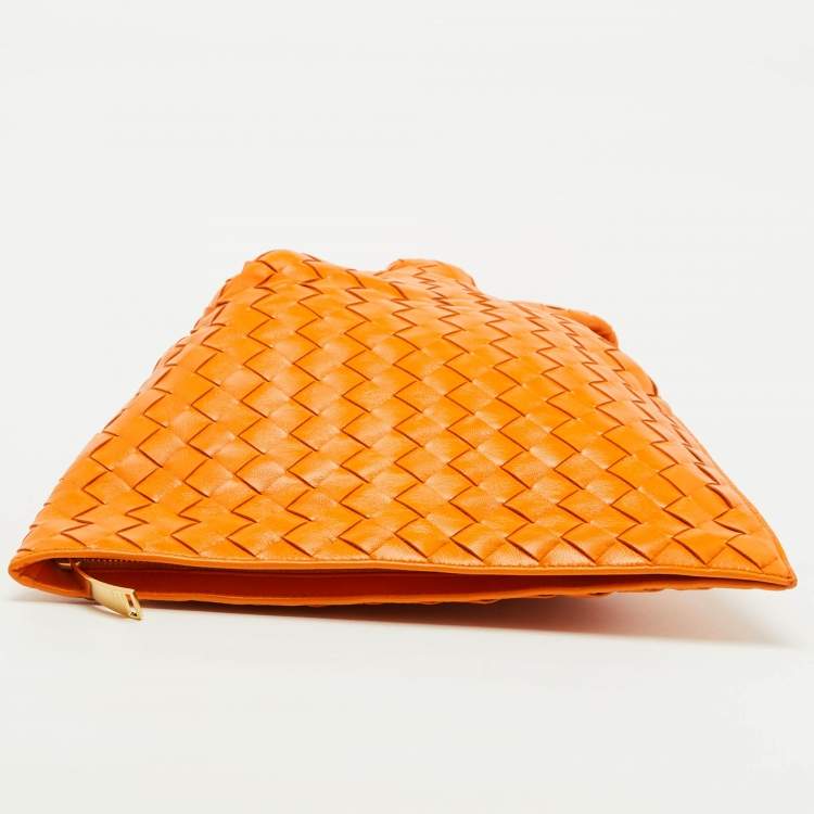 Pre Owned Bottega Veneta Orange Intrecciato Leather Twist Clutch