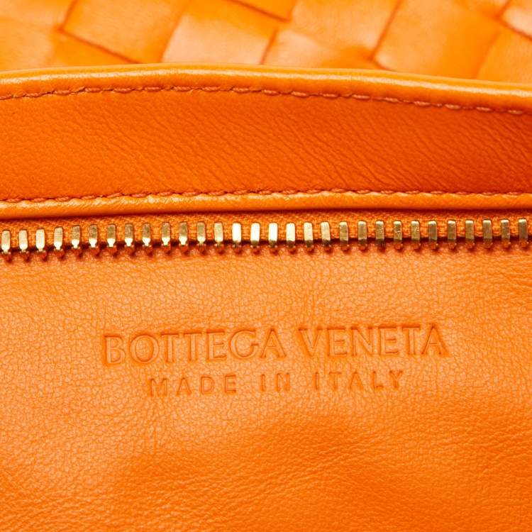 Pre Owned Bottega Veneta Orange Intrecciato Leather Twist Clutch