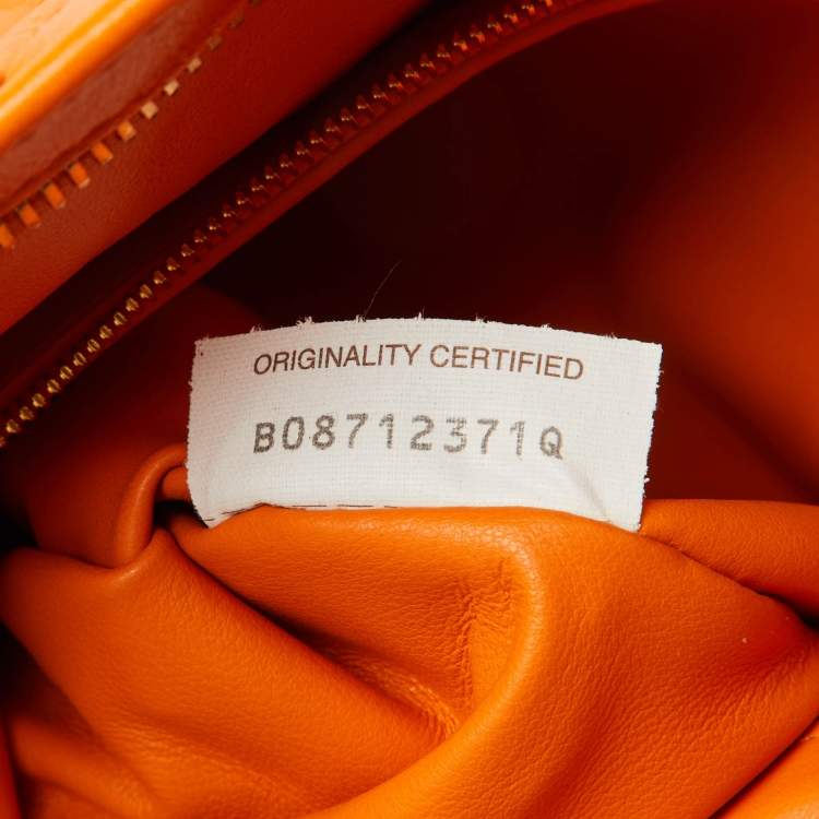 Pre Owned Bottega Veneta Orange Intrecciato Leather Twist Clutch