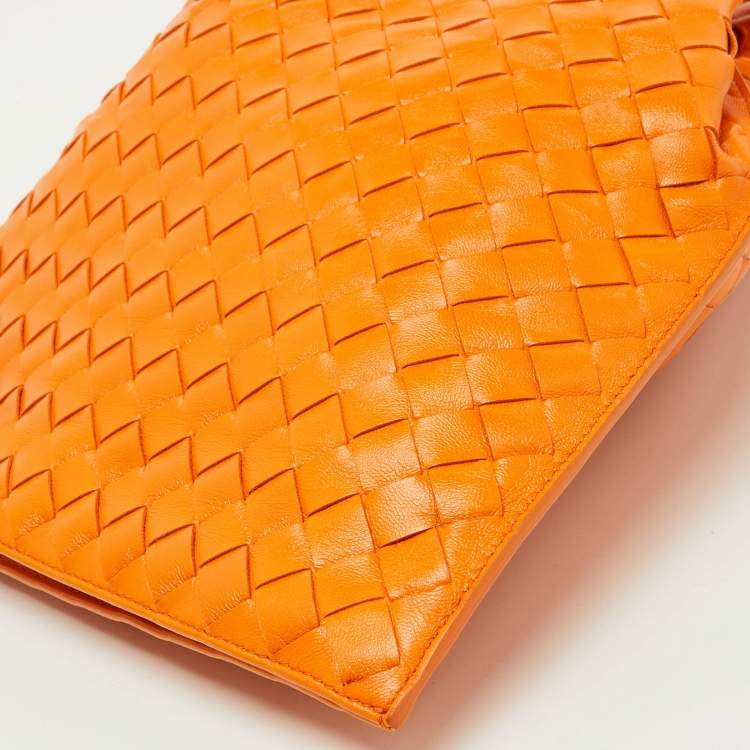 Pre Owned Bottega Veneta Orange Intrecciato Leather Twist Clutch