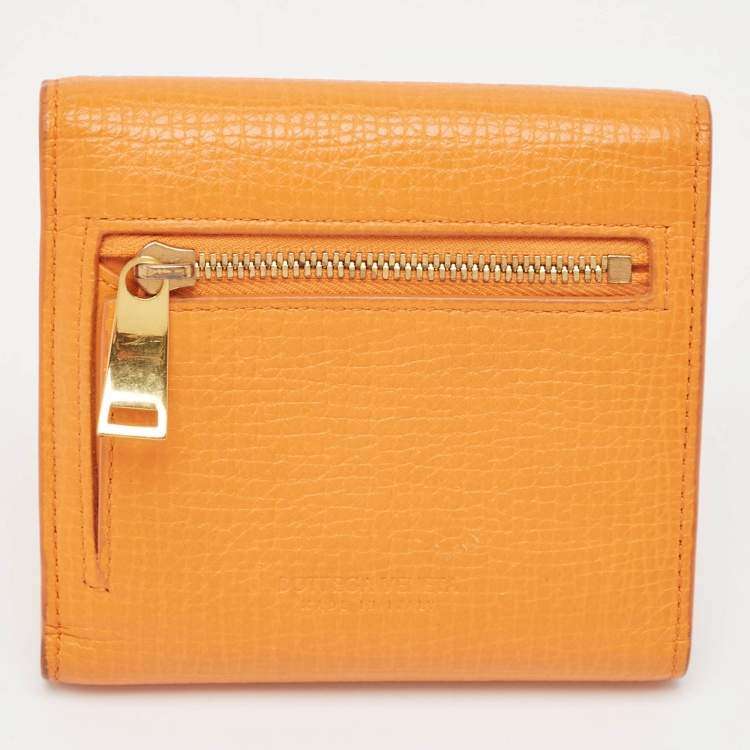 Pre Owned Bottega Veneta Orange Leather Palmellato Trifold Wallet