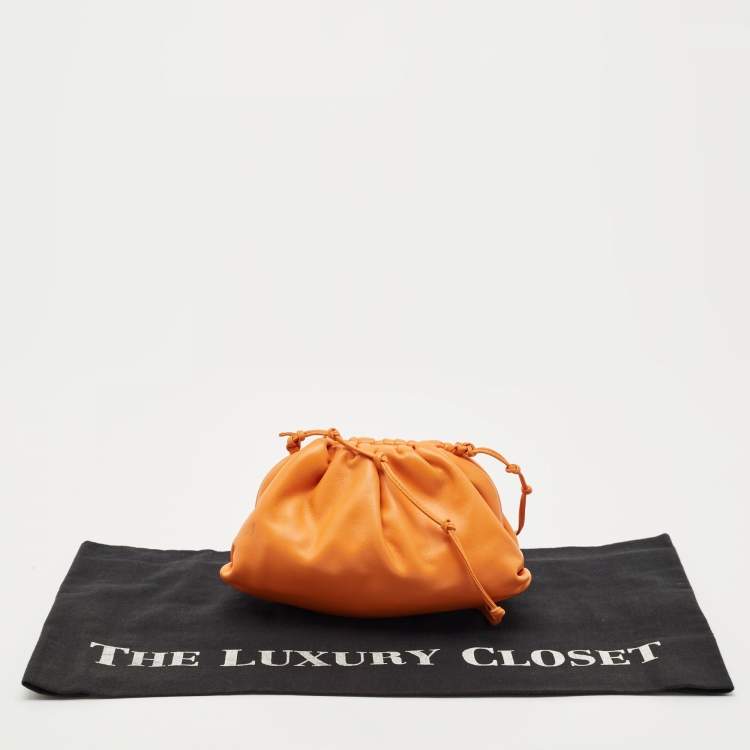 Pre Owned Bottega Veneta Orange Leather Mini The Pouch Bag