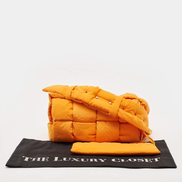 Pre Owned Bottega Veneta Orange Intreccio Nylon Medium Padded Tech Cassette Bag