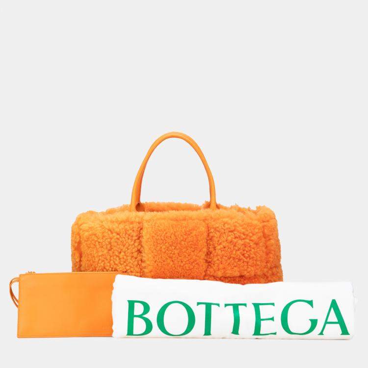 Pre Owned Bottega Veneta Orange Small Shearling Intrecciato Arco Tote