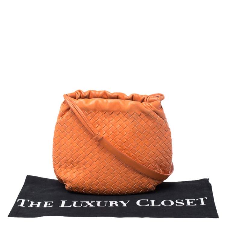 Pre Owned Bottega Veneta Orange Intrecciato Nappa Leather Drawstring Bag