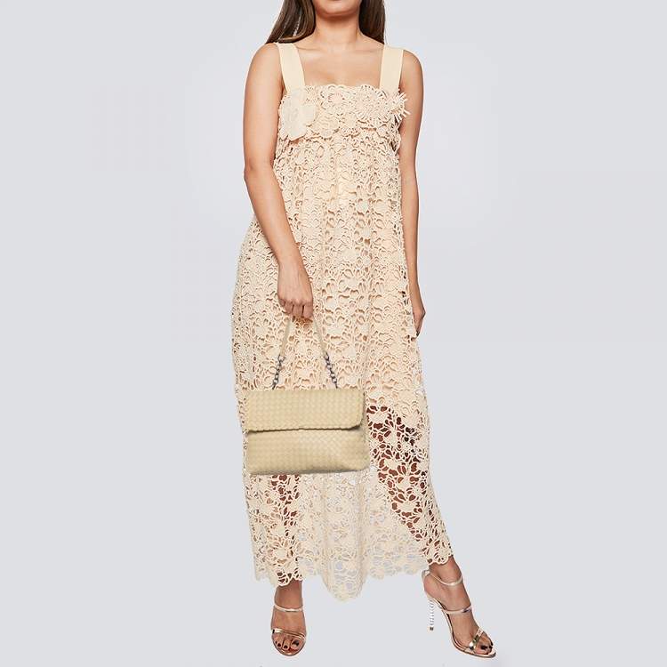 Pre Owned Bottega Veneta Cream Intrecciato Leather Olimpia Top Handle Bag