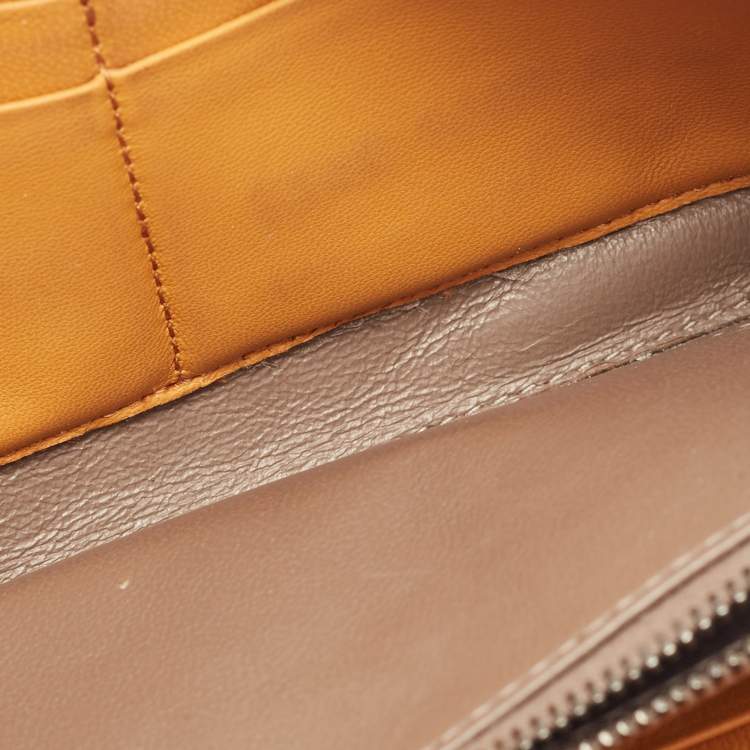Pre Owned Bottega Veneta Saffron Yellow Intrecciato Leather Zip Continental Wallet