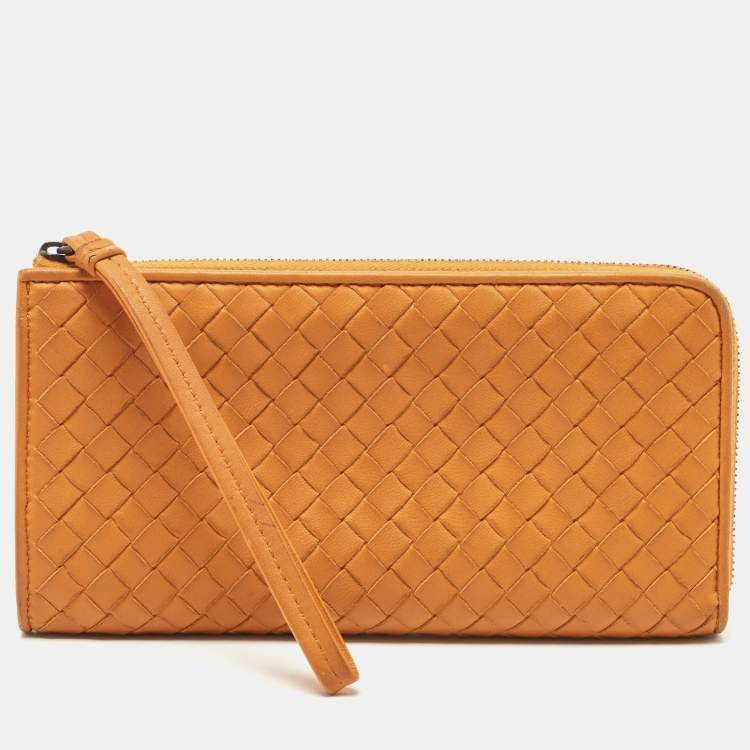 Pre Owned Bottega Veneta Saffron Yellow Intrecciato Leather Zip Continental Wallet