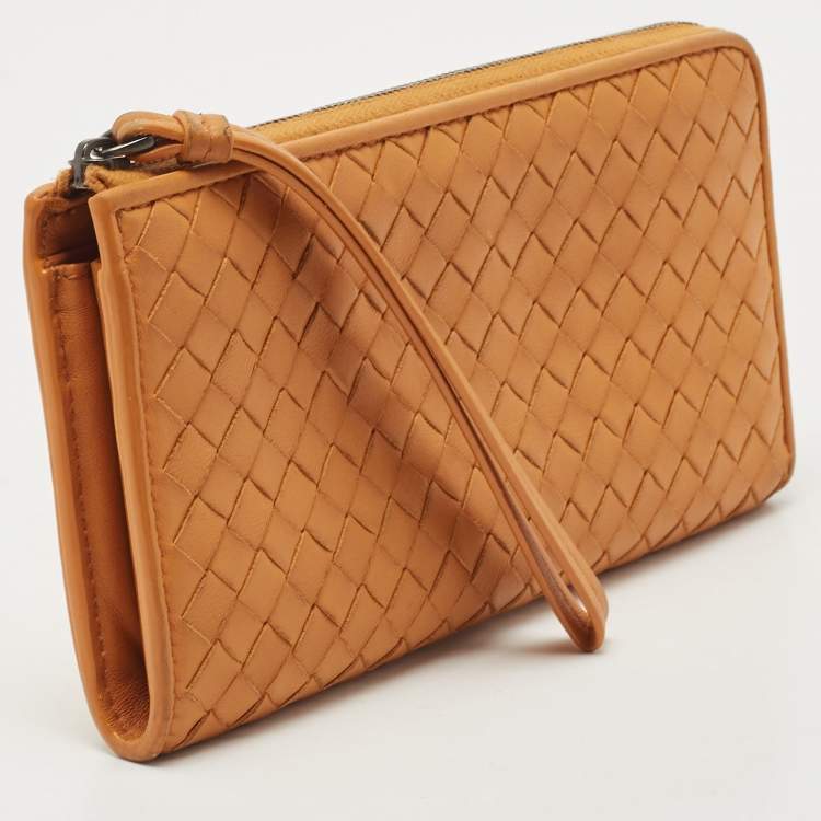 Pre Owned Bottega Veneta Saffron Yellow Intrecciato Leather Zip Continental Wallet