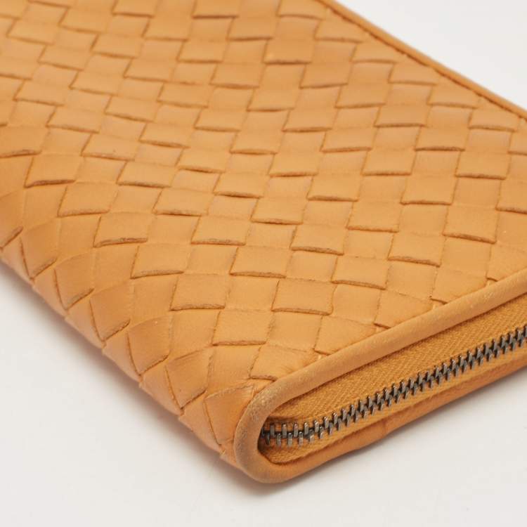 Pre Owned Bottega Veneta Saffron Yellow Intrecciato Leather Zip Continental Wallet
