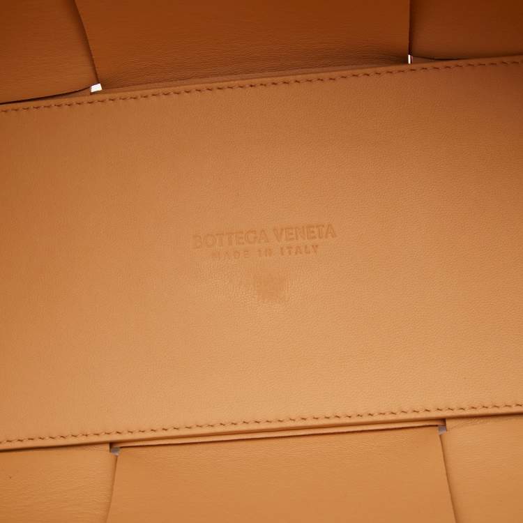 Pre Owned Bottega Veneta Orange Intrecciato Leather Arco Tote