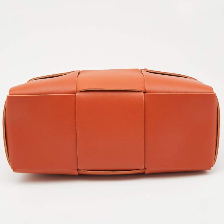 Pre Owned Bottega Veneta Orange Intrecciato Leather Arco Tote