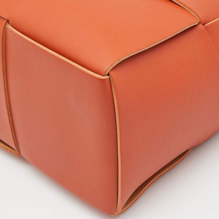 Pre Owned Bottega Veneta Orange Intrecciato Leather Arco Tote