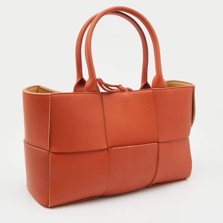 Pre Owned Bottega Veneta Orange Intrecciato Leather Arco Tote