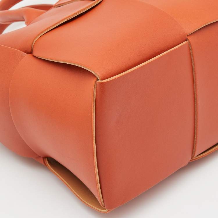 Pre Owned Bottega Veneta Orange Intrecciato Leather Arco Tote