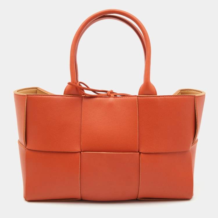 Pre Owned Bottega Veneta Orange Intrecciato Leather Arco Tote