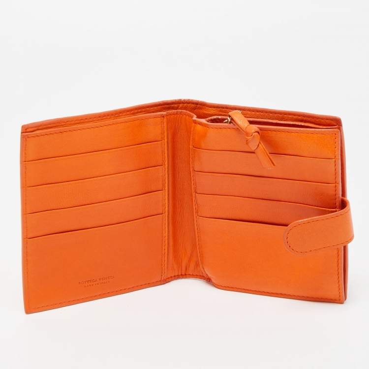 Pre Owned Bottega Veneta Orange Intrecciato Leather Bifold Zip Wallet