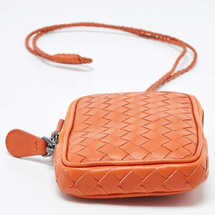 Pre Owned Bottega Veneta Orange Intrecciato Leather Zip Strap Pouch