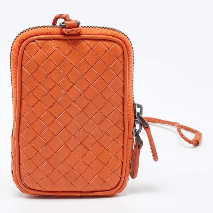 Pre Owned Bottega Veneta Orange Intrecciato Leather Zip Strap Pouch
