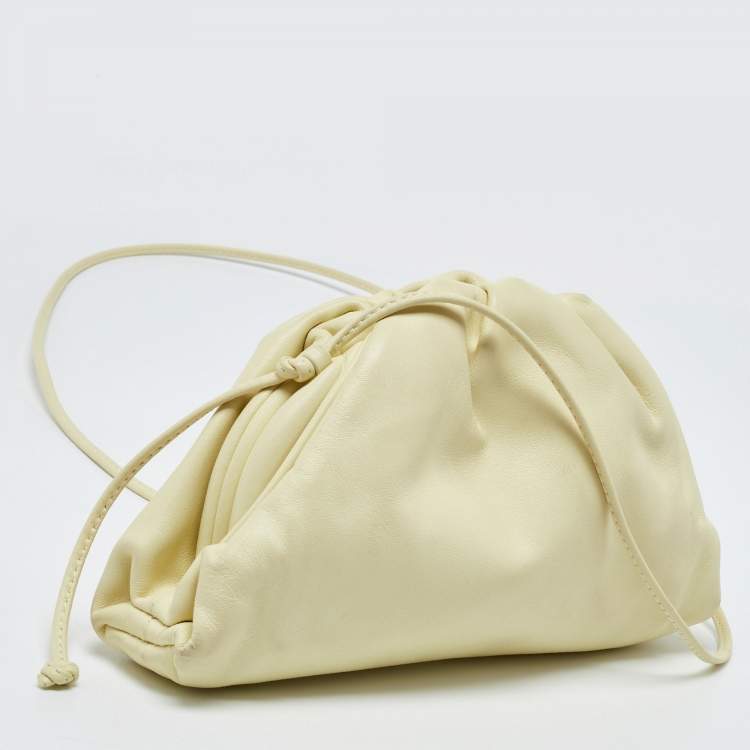 Pre Owned Bottega Veneta Light Yellow Leather Mini The Pouch Bag
