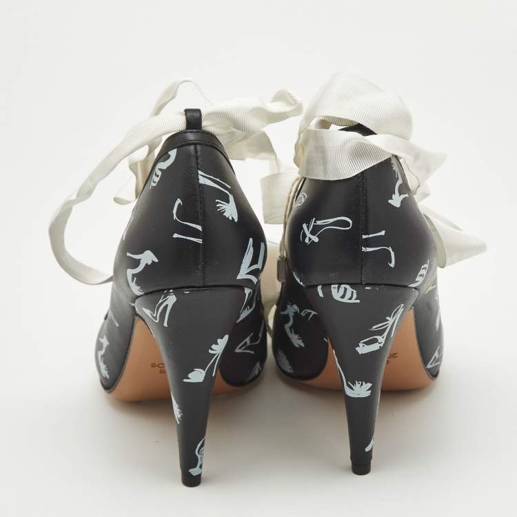 Pre Owned Boutique Moschino Printed Black Leather Ankle Wrap Pumps Size 37