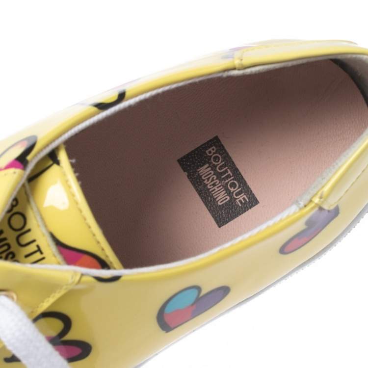 Pre Owned Boutique Moschino Yellow Patent Leather Heart Low Top Lace Up Sneakers Size 38