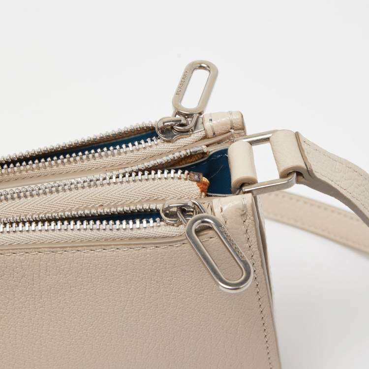 مملوكة مسبقًا Burberry Cream Leather Triple Zip Crossbody Bag