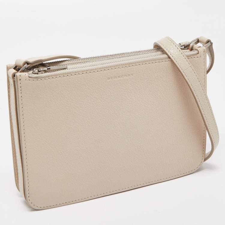 مملوكة مسبقًا Burberry Cream Leather Triple Zip Crossbody Bag