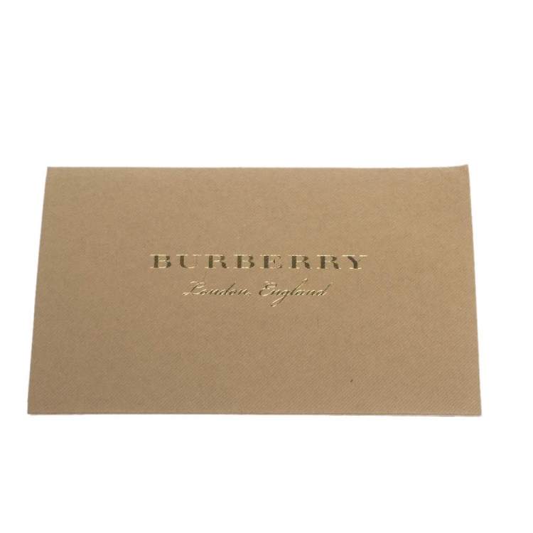 Pre Owned Burberry Caramel Marbled Resin Palladium Plated Double Grommet Earrings