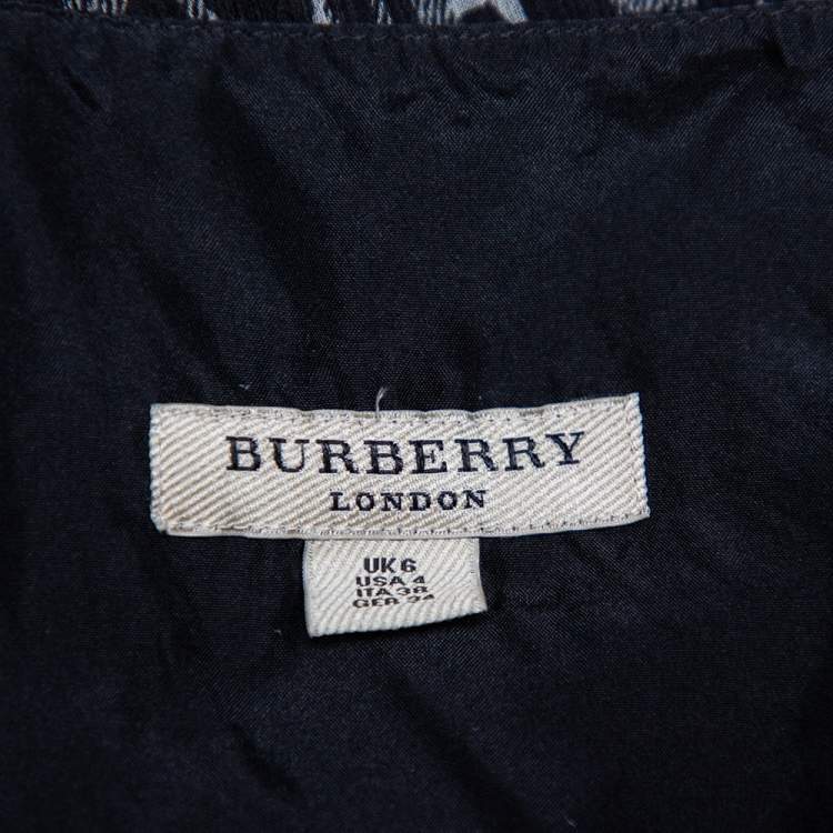 Pre Owned Burberry Black Animal Printed Silk Plunge Neck Draped Peplum Top S
