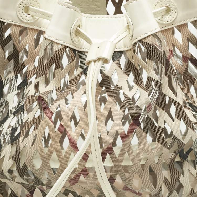 Pre Owned Burberry White/Beige Nova Check Laser Cut PVC and Patent Leather Drawstring Hobo