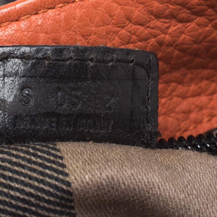 Pre Owned Burberry Orange Leather Hook Flap Backpack