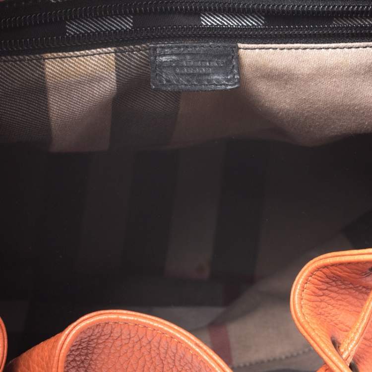 Pre Owned Burberry Orange Leather Hook Flap Backpack